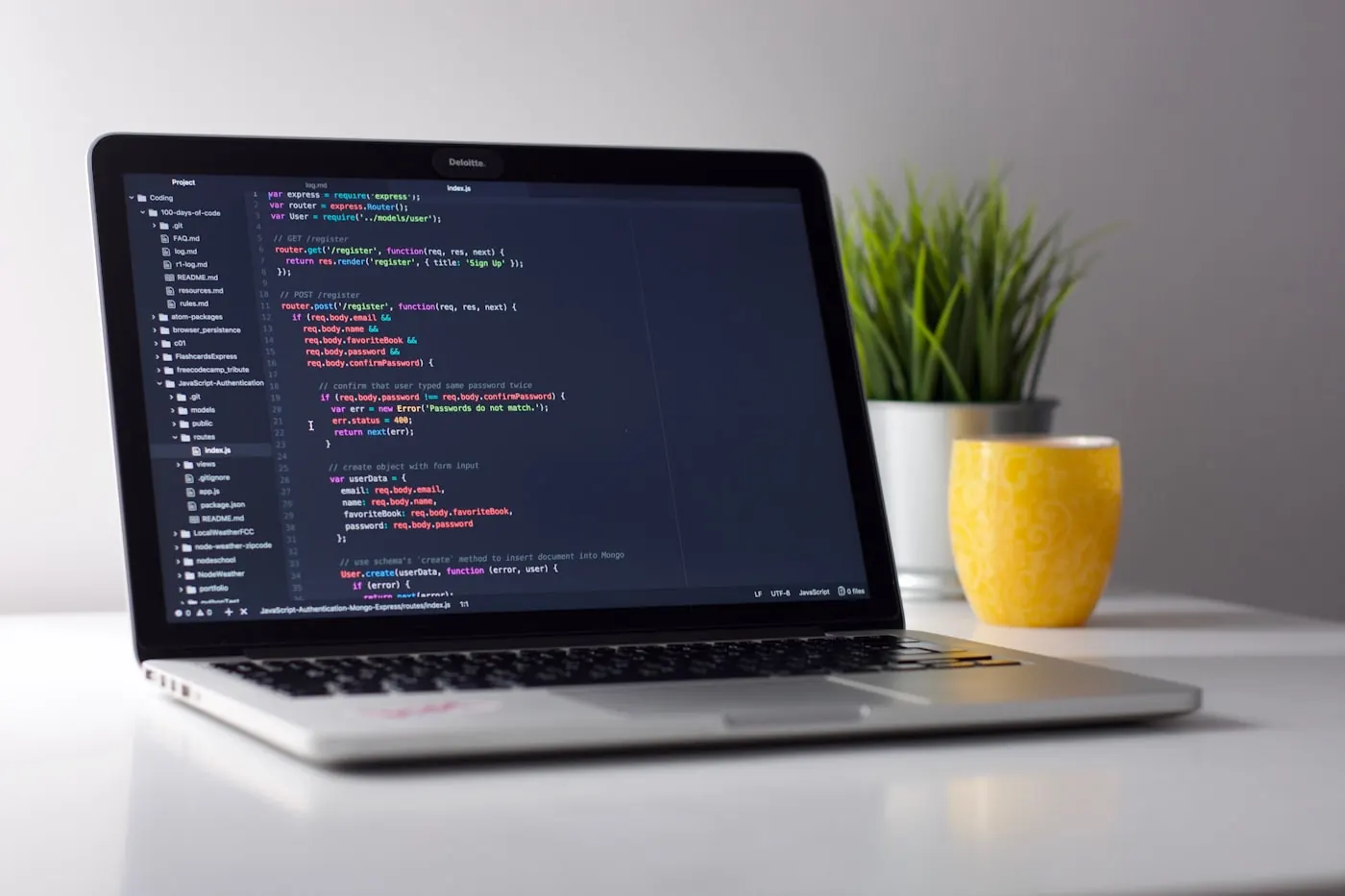 Laptop showing an application project in an editor.